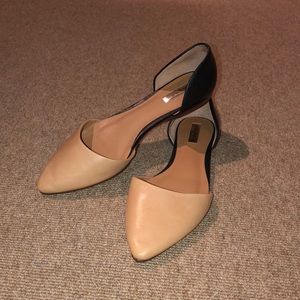 Halogen nude and black pointed toe flats
